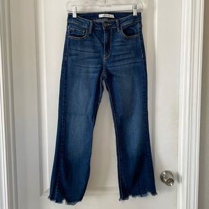 Cropped frayed mid rise jeans. (From CJLA)